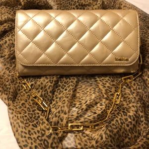 NWOT BEBE More than a Clutch/Wallet. Gold Chain.